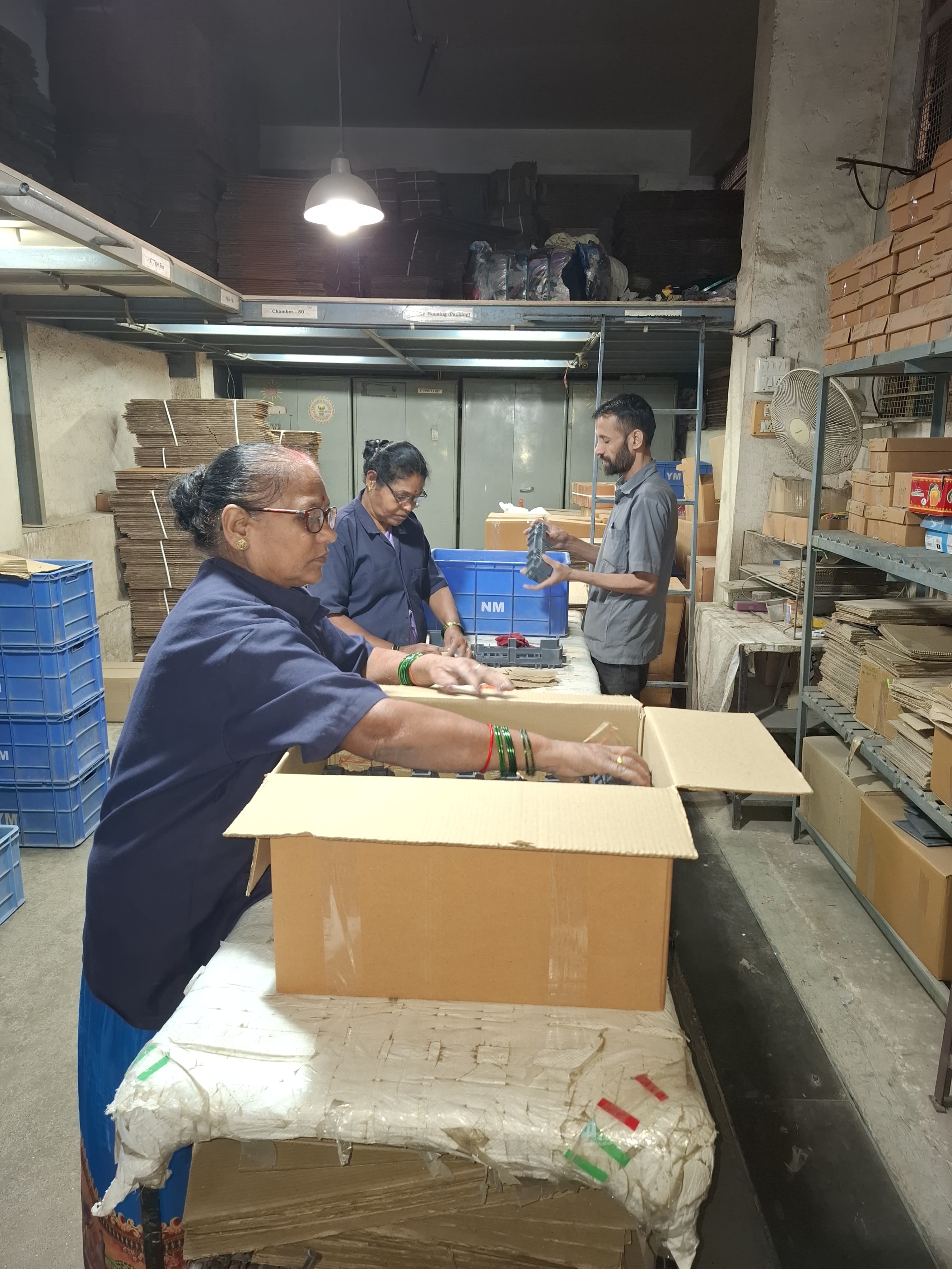 Natraj Moulds team preparing components for dispatch